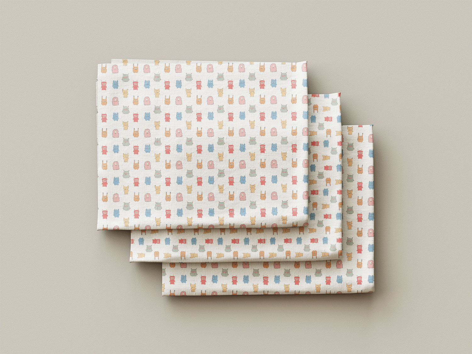 A mockup of the Friends in the Bed fabric, illustrated just for Wooly Tops by Aprille.